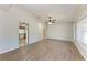 Bright living room with wood-look flooring and lots of natural light at 309 Aurora St, Port Charlotte, FL 33948