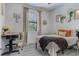 Cozy bedroom with a comfortable bed, modern decor, and a functional workspace at 3136 Joshua St, Port Charlotte, FL 33948