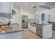 Contemporary kitchen with granite counters, stainless appliances, and plenty of cabinet space at 3136 Joshua St, Port Charlotte, FL 33948