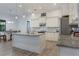 Modern kitchen featuring an island, stainless steel appliances, and open layout perfect for entertaining at 3136 Joshua St, Port Charlotte, FL 33948