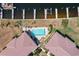 Residential real estate showcasing a pool, boat docks and canal access, complemented by lush landscaping and neighborhood views at 3221 White Ibis Ct # D2, Punta Gorda, FL 33950