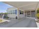 Charming home exterior with covered carport, easy parking, and well-maintained landscaping at 3305 Blue Jay Ln, Englewood, FL 34224