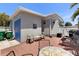 Outdoor patio with seating, lush surroundings, and room for entertaining and relaxation at 3305 Blue Jay Ln, Englewood, FL 34224