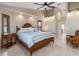 Serene main bedroom with hardwood floors, natural light, and ensuite bathroom at 340 Belaire Ct, Punta Gorda, FL 33950