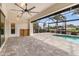 Relaxing pool area with an extended screened lanai, fan, and outdoor seating at 340 Belaire Ct, Punta Gorda, FL 33950