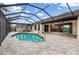 Stunning backyard pool with waterfront views and indoor/outdoor flow at 340 Belaire Ct, Punta Gorda, FL 33950