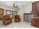 Cozy sitting area with comfortable chairs and built-in wine storage at 340 Belaire Ct, Punta Gorda, FL 33950