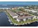 Scenic waterfront condo community boasting private boat docks and lush landscaping with building 10 highlighted in red at 347 Coldeway Dr # G6, Punta Gorda, FL 33950