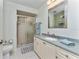Well-maintained bathroom with shower, vanity, and neutral-toned decor at 347 Coldeway Dr # G6, Punta Gorda, FL 33950