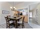 Dining room and kitchen view featuring wood table and cabinetry at 347 Coldeway Dr # G6, Punta Gorda, FL 33950