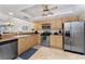 Well-equipped kitchen with stainless steel appliances, light wood cabinets, and ample counter space at 347 Coldeway Dr # G6, Punta Gorda, FL 33950