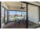 Outdoor patio with ceiling fan, table, chairs, and views of the pool at 347 Coldeway Dr # G6, Punta Gorda, FL 33950