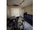 Bedroom with a ceiling fan and an entrance to another room at 3538 Pinetree St, Port Charlotte, FL 33952