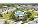 Aerial view of the community pool, cabanas, lounge chairs and lush landscaping at 3664 Tin Cup Blvd, Sarasota, FL 34232