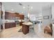 Modern kitchen with a center island, stainless steel appliances, and an open floor plan at 3664 Tin Cup Blvd, Sarasota, FL 34232