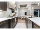 Modern kitchen boasts sleek appliances, ample counter space and nearby dining area at 3729 Peace River Dr, Punta Gorda, FL 33983
