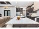 Open concept kitchen features stainless steel appliances and a large marble island at 3729 Peace River Dr, Punta Gorda, FL 33983