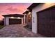 New construction home with three car garage, brick paver driveway, and landscaped yard at 3729 Peace River Dr, Punta Gorda, FL 33983