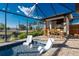 Enclosed pool area with a covered outdoor kitchen and bar seating at 3729 Peace River Dr, Punta Gorda, FL 33983