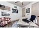 Office space featuring a cow print chair, light wood desk, and sports memorabilia on the wall at 3729 Peace River Dr, Punta Gorda, FL 33983
