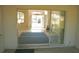 Enclosed porch with an open view to the home's entryway, seamlessly blending indoor and outdoor spaces at 5050 Prosch Cir, North Port, FL 34288