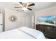 This bedroom features a TV and closet at 8115 Manasota Key Rd, Englewood, FL 34223