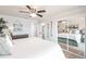 This spacious bedroom features a closet and attached bathroom at 8115 Manasota Key Rd, Englewood, FL 34223
