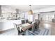 A cozy dining area adjacent to the kitchen and living room offers an inviting gathering space at 8115 Manasota Key Rd, Englewood, FL 34223