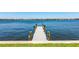 Newly refinished dock, ready for enjoying the waterfront views and access at 8115 Manasota Key Rd, Englewood, FL 34223