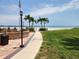 Convenient beach access with a walkway and seating area at 851 Bayway Blvd # 403, Clearwater Beach, FL 33767