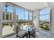 This condo offers a cozy breakfast nook with large windows, providing bright and relaxing dining with city views at 851 Bayway Blvd # 403, Clearwater Beach, FL 33767