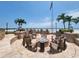 An inviting community fire pit area on the beach with comfortable seating at 851 Bayway Blvd # 403, Clearwater Beach, FL 33767