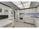 Bright kitchen with white appliances and ample countertop space for meal preparation at 851 Bayway Blvd # 403, Clearwater Beach, FL 33767