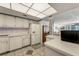 Well-maintained kitchen featuring white appliances and plenty of cabinet space at 851 Bayway Blvd # 403, Clearwater Beach, FL 33767
