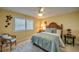 Bedroom featuring nice rug, queen bed and yellow walls at 925 Don Juan Ct, Punta Gorda, FL 33950