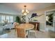 Bright dining area featuring a round wooden table and decorative nautical accents at 925 Don Juan Ct, Punta Gorda, FL 33950