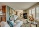 Open-concept living room with access to kitchen and stylish decor at 925 Don Juan Ct, Punta Gorda, FL 33950