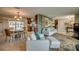 Bright, combined living and dining area offering an open floor plan and views of the lanai at 925 Don Juan Ct, Punta Gorda, FL 33950