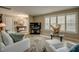 Cozy living room with plantation shutters, comfortable seating, and a decorative rug at 925 Don Juan Ct, Punta Gorda, FL 33950