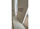 Modern bathroom with decorative stone tile flooring and a niche featuring unique wooden accents at 10522 Riverside Rd, Port Charlotte, FL 33981