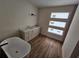 Luxurious bathroom with a soaking tub, dual vanity, and modern finishes at 10522 Riverside Rd, Port Charlotte, FL 33981