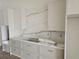 Stylish kitchen boasts stone countertops, designer backsplash, and modern fixtures at 10522 Riverside Rd, Port Charlotte, FL 33981