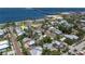 A beautiful view of a neighborhood with palm trees, the beach, and a view of the bay at 110 Gilchrist St, Punta Gorda, FL 33950