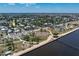 Stunning aerial view of the property highlighting its location near the waterfront, parks, and community amenities at 110 Gilchrist St, Punta Gorda, FL 33950