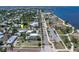 A beautiful aerial view of the community near the bay, tennis courts, and downtown at 110 Gilchrist St, Punta Gorda, FL 33950