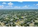 Expansive aerial view showcasing the vastness of the neighborhood's mature trees at 1210 Marlow St, Port Charlotte, FL 33952
