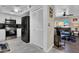 Bright kitchen featuring stainless steel appliances, white cabinetry, and tiled backsplash at 1210 Marlow St, Port Charlotte, FL 33952