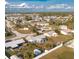Aerial view of home with surrounding fenced backyard in a residential neighborhood at 13449 Muriel Ave, Port Charlotte, FL 33981