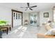 Sunroom with bright natural light, sliding glass doors, and comfortable seating at 13449 Muriel Ave, Port Charlotte, FL 33981