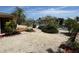 Tropical waterfront backyard featuring lush greenery, serene waters, and a charming deck perfect for relaxation at 187 Beeney Se Rd, Port Charlotte, FL 33952